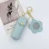 Nuevo Espejo de Maquillaje Portátil con Flor para Labial, Bolso de Labial de Moda, Regalo de Cuero, Colgante Pequeño, Llavero para Niñas