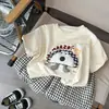Conjunto de calça xadrez infantil, novo estilo coreano moderno de verão, top fofo de manga curta com desenho para meninos e meninas, solto e casual