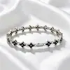 Bestseller transfronterizo: Pulsera de trébol de cuatro hojas de diamantes completos, pulsera de Blancanieves, pulsera de tenis, joyería versátil de mujer lujosa y colorida