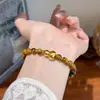 Pulseira Simples Retro Versátil de Cobre Oco Semente de Cabacinha Pedra Olho de Tigre para Mulheres, Pulseira de Contas de Luxo Leve Nicho Joias de Alto Padrão