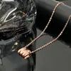 Colar Cruzado Novo de Alto Padrão com Letra M Não Desbota em Aço Titânio FASHION Moda Popular Luxo Leve Ossos de Cobra Explosivos