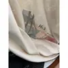 [Recomendação Principal] Nova Coleção Primavera/Verão 26 Yuran: Camiseta de Manga Curta com Ilustração da Praia de Barcelona em Algodão de Cânhamo