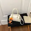 Bolsa de Bolos Nueva de Estilo Coreano para la Primavera 2026, de Nicho, Simple y Exquisita para Mujer, Bolso de Hombro Cruzado de Moda y Versátil para el Trayecto