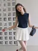 Shorts blancos de lino para mujer, nuevo estilo verano 2026, estilo deportivo casual holgado, cintura elástica, shorts rectos de línea A de cinco puntos