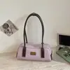 Bolsa feminina de design único para o dia a dia, novo modelo verão 2026, bolsa de mão estilo bowling, alto valor estético, bolsa de ombro color-blocking