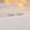 Pendientes de botón con lazo de lujo cruzado súper brillantes de venta caliente, moda, pequeños, exquisitos, de circonita, simples, versátiles para el día a día