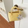 Bolso de mano de alta gama para mujer, modelo nuevo 2026, bolso de hombro y cruzado súper popular, bolso tote pequeño exquisito, bolso tipo cubo versátil