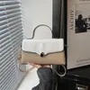Estilo Coreano 2026 Nueva Moda Hebilla de Candado Fresca Gran Capacidad Elegante Temperamento Cruzada de Mano de un Solo Hombro Bolso Cuadrado Pequeño para Mujeres