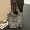 Bolso tote de mujer estilo japonés, elegante y de gran capacidad, nuevo 2026 de moda popular en internet, bolso de hombro de alta gama con estampado de leopardo, bolso de mano