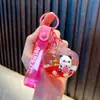 Chaveiro de panda cheio de óleo, garrafinha com areia movediça de maçã, pingente de bolsa, chaveiro de carro, prêmio de máquina de pegar, pequeno presente