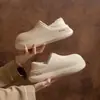Bolsa impermeable y pantuflas de algodón para mujer 2026 Otoño Invierno nuevo estilo interior con felpa cálida antideslizante para el hogar suela suave zapatos de algodón para hombre