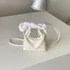 Bolsa Mini Bolinho de Renda Fofa Estilo Coreano 2026 Novo Estilo Versátil Feminina Ins Nicho Bolsa de Mão Bolsa de Ombro Bolsa Transversal