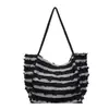 Bolsa de lona a rayas casual para mujer, nueva moda 2026, bolso de hombro de gran capacidad, bolso de diseño casual de nicho para el día a día
