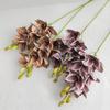 Pintura a óleo simulação de cor sentir grande flor Huilan abraço balde lanche de Ano Novo flor decoração simulação flor falsa 11 flor cymbidium
