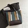 Bolsa feminina estilo preguiçoso 2024 nova bolsa de lona listrada contrastante da moda bolsa de ombro com axila da moda