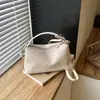 Bolsa com Textura Trançada Feminina 2026 Nova Verão Nicho Trabalho Diário Bolsa de Ombro Único Toque de Luxo Leve Retro Bolsa Transversal