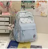 Mochila Escolar Feminina Estilo Japonês Novo Aparência de Alta Qualidade Desenho Animado Laço Xadrez Mochila para Aluno do Ensino Fundamental Leve Mochila de Viagem