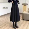 Falda midi de lana gris para mujer 2026 nuevo otoño e invierno estilo coreano elegante ajustada recta lápiz mujer