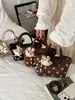 Bolso pequeño de ante para mujer, nuevo diseño 2026, estilo de nicho, bolso de mano tipo empanada, de alta gama y versátil, bolso de hombro o bolso cruzado