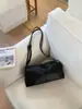 Bolso tipo almohada de nuevo estilo coreano de diseño nicho para comercio exterior transfronterizo, Bolso de hombro elegante y moderno, Bolso versátil para el antebrazo para el día a día para mujeres