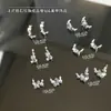Decoraciones brillantes de zirconia cúbica y perlas para uñas, con un lujoso diseño de estilo francés con bordes redondeados tridimensionales y adornos de diamantes completos.