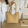 Bolso Tote Tejido Simple de Gran Capacidad Transfronterizo para Mujer 2026 Verano Nuevo Estilo Nicho Elegante Bolso de Hombro para el Trabajo y los Viajes