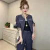 (En stock)Conjunto de Dos PiezasModa Femenina Chic de Alta Gama con Retazos Conjunto Adelgazante de Top y Pantalones D10253
