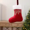 Nuevos calcetines de Navidad transfronterizos, decoraciones navideñas, gorros de Navidad rojos y blancos, guantes, bolsas de regalo y pequeños adornos para árbol de Navidad