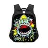 Mochila Nueva Estilo Graffiti Protectora de Espalda de Amazon 2026 para Estudiantes de Preescolar y Primaria Grados 1-2 Bolsa Escolar de 14 pulgadas