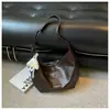 Bolso casual de nicho estilo coreano transfronterizo para mujer, nuevo bolso versátil de moda para el trabajo, bolso de hombro y cruzado simple de alta calidad