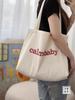 Bolso de hombro de lona con alfabeto coreano, sencillo y artístico, combinable con todo, de gran capacidad, para estudiantes y viajeros.