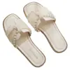 Pantuflas de verano para mujer para exteriores con suela plana, sandalias estilo francés con perlas y lazos, nuevo estilo de hada 2026