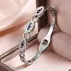 Pulseira de Aço Inoxidável Europeia e Americana Luxo Leve Olho de Diabo Cravejada com Strass Nicho Toque de Alto Padrão Pulseira Feminina de Aço Titânio