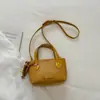Bolso de mano de moda para el trabajo estilo coreano 2026 verano nuevo bolso cruzado de moda color liso simple nicho bolso de hombro