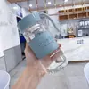 Taza de agua de vidrio de borosilicato de celebridad de internet portátil para hombres y mujeres con tapa taza transparente simple con funda para taza taza para llevar taza de té