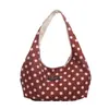 Las populares carteras pequeñas frescas y elegantes de este año para mujer, nuevos bolsos de hombro de lunares de moda para el otoño de 2026, bolsos versátiles para el antebrazo