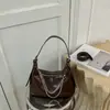 Bolsa Feminina de Axila 2026 Nova Bolsa Dumpling de Outono High-End Retrô Exquisita para o Dia a Dia Bolsa de Ombro Único Bolsa Transversal