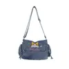 Elegante bolso de hombro de mezclilla con nuevo lavado retro, versátil y fácil de combinar, perfecto para uso casual y para ir al trabajo, con múltiples compartimentos
