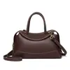 Bolsa tipo almohada de alta gama estilo coreano para mujer, nuevo modelo 2026, bolso de mano pequeño elegante para el trabajo y uso casual, bolso tote cruzado de nicho