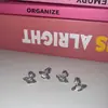 Clavos para Hélice de Hueso de Oreja de Acero de Titanio Incrustados con Diamantes de Saturno con Goteo de Color, Clavos de Oreja de Vidriado Goteante, Pendientes Retro Elegantes Simples, Estilo Nuevo