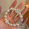 Pulsera de Perla con Corazón de Zircón, Moderna y Versátil, Exquisita y Lujosa, Pulsera de Gama Alta con Sentido del Diseño, Joyería de Mano de Nicho y Elegante