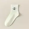 Novedad de principios de otoño Estilo ins Moderno Lindo Dibujos Animados Jacquard Estilo Básico Versátil Calcetines hasta la mitad de la pantorrilla Mujer Estudiante Calcetines Deportivos