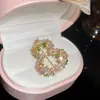 Aretes de Zirconia en Forma de Calabaza Electrochapados en Oro Real de 18K, Estilo Fresco Coreano y Japonés, Aretes Juveniles con un Toque de Lujo, Aretes de Lujo Ligero al por Mayor