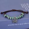 Suministro de fábrica nuevo brazalete retro chino de mariposa nicho joyería de cerámica colgante cuerda de mano tejida brazalete estilo nacional