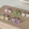Pendientes Planos en Espiral de Trébol de Cuatro Hojas Super Brillantes para Mujer, Acero de Titanio, Cuidado Delicado para Perforaciones, de Alta Gama, Dulces y Versátiles
