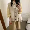 Chaleco de punto casual a la moda para mujer, nuevo estilo coreano otoño e invierno 2026, rejuvenecedor, tejido grueso, chaleco cárdigan con botones de cuerno