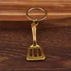 Accesorios de joyería de aleación colgante de pala colgante de llavero olla de oro de aleación vintage olla colgante pequeño venta caliente transfronteriza