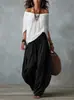 2026 Conjunto de mujer transfronterizo europeo y americano Amazon TK nuevo top largo holgado de hombros descubiertos + pantalones de campana
