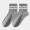 Calcetines clásicos de otoño e invierno para mujer, calcetines planos de estilo universitario a rayas, calcetines de media pantorrilla para mujer con alto contenido de algodón, industria de calcetines Zhuji