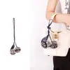 Colgante de cuero de cereza con borla estilo francés, un regalo portátil para viajes, llavero de coche, accesorio para bolso de teléfono, disponible para venta al por mayor